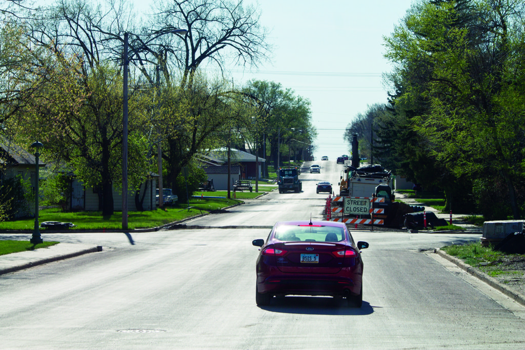 The city is working on a largescale project on Divide Street, from Second to Eighth Avenues, to replace a water main along the street. (Pioneer Photo by Bryce Martin)