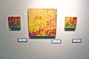 Snavely's art includes several different aspects of art and relies on a limited palate of red, green and gold colors. PHOTO BY BRYCE MARTIN/PIONEER