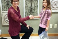 Student, 8, sells bracelets to raise funds for community cupboard