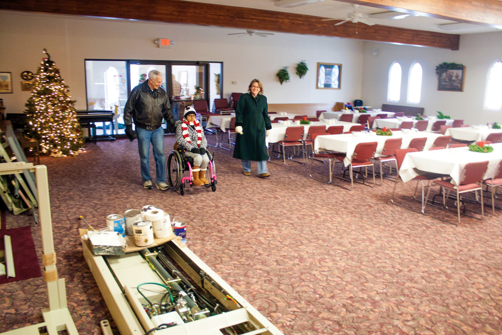 Ron, Michelle and Maija Olson enter Bowman Methodist Church for an interview with The Pioneer in 2014. (Pioneer File Photo/Bryce Martin)