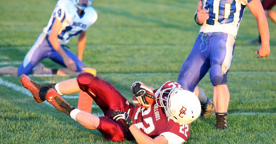 Brayden Jorgensen (22) scores one of Bowman County’s touchdown. The varsity team won 26-20 against Richardton/Taylor/Hebron on Sept. 16 (Pioneer Photo by Jason Waskiewicz)