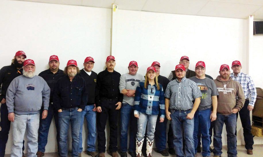RHAME FIRE DEPARTMENT — (Back) Tate Wallman, Clay Martian, Tom Johnson, Jess Getz, Darrell Getz, Troy Miller, Les Schaefer, and Pat Getz. (Front) Ed Holecek, Steve Pfau, Alison Getz, Neyl Eagon, Shaun Bergquist and Paul Fischer.